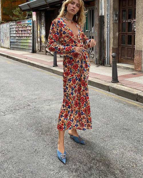 floral maxi wrap dress styled with balenciaga pumps