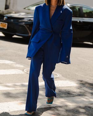what to wear as a wedding guest outfit idea - oversized electric vlue suit