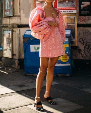 wedding guest outfit idea - pink puff sleeve mini dress