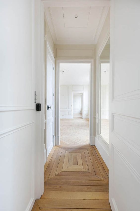 interior mood board hallway with white wooden panels and light brown wooden floor