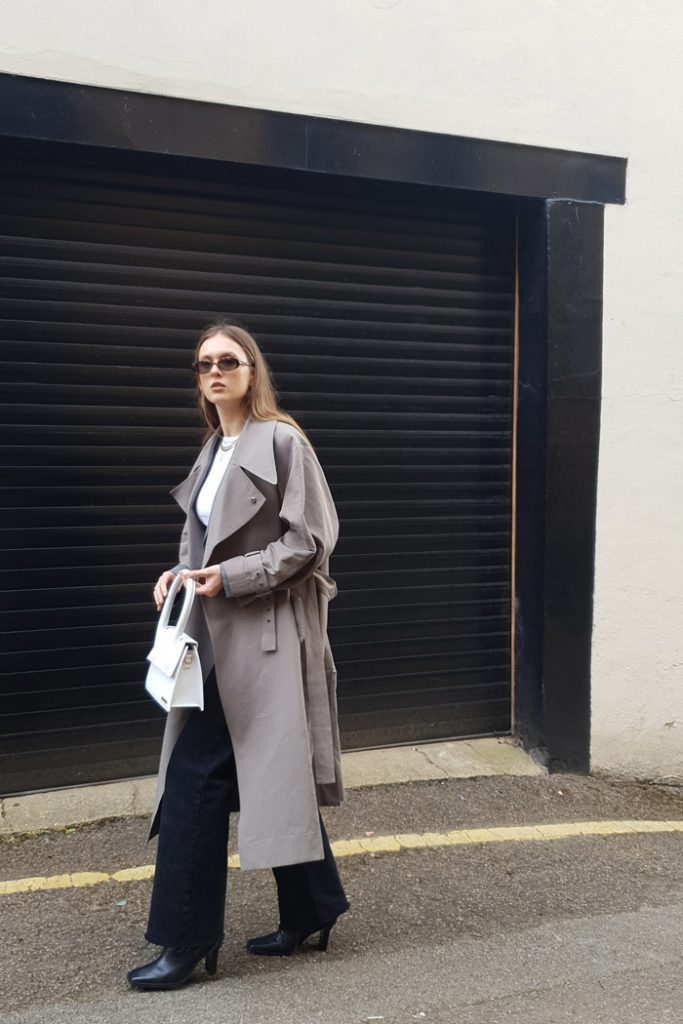 trench coat look styled with it-bag