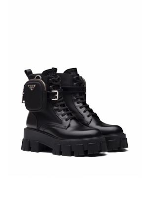 Winter 2022 Boot Trends Prada lace-up leather Combat boots with signature logo nylon pouch