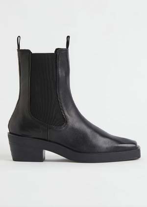 square-toed boot trend 2022 - black leather square-toed ankle boots