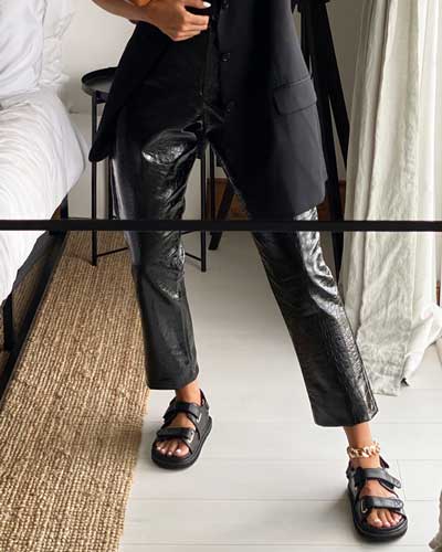 flat chunky minimalistic leather sandals styled with leather trousers and blazer