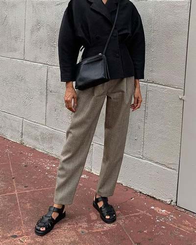 fisherman sandals styled with chic cigarette trousers and black blazer
